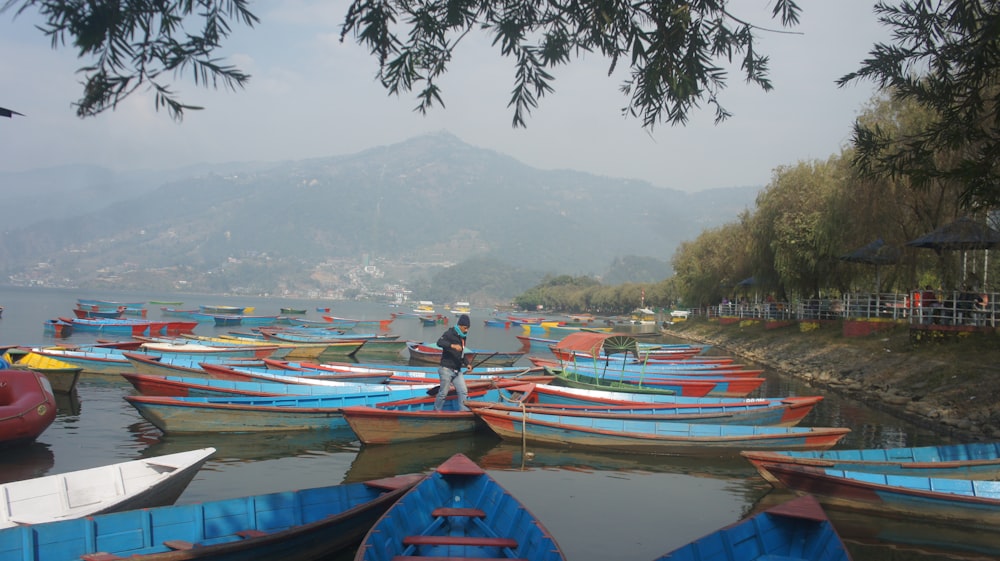 a bunch of boats that are sitting in the water