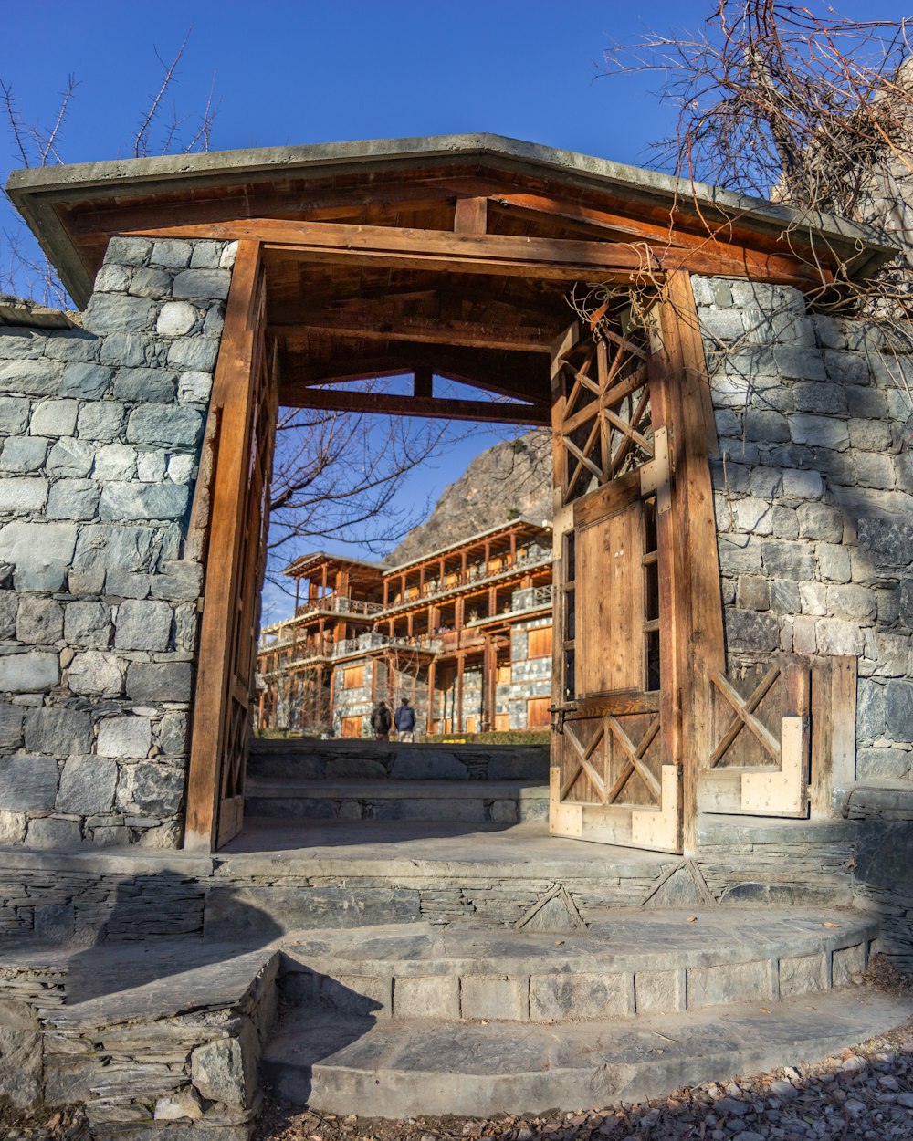 a stone building with a wooden door