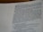 A close-up view of a page from a Bible, focusing on Isaiah 7:1. The text is printed in black on a white page, with some portions in bold and larger font indicating chapter numbers and headings.