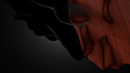A blend of abstract shapes with smooth curves and textures, featuring dark black and deep reddish-brown shades. The surface appears to have a combination of glossy and matte finishes, creating a mysterious and dramatic effect.