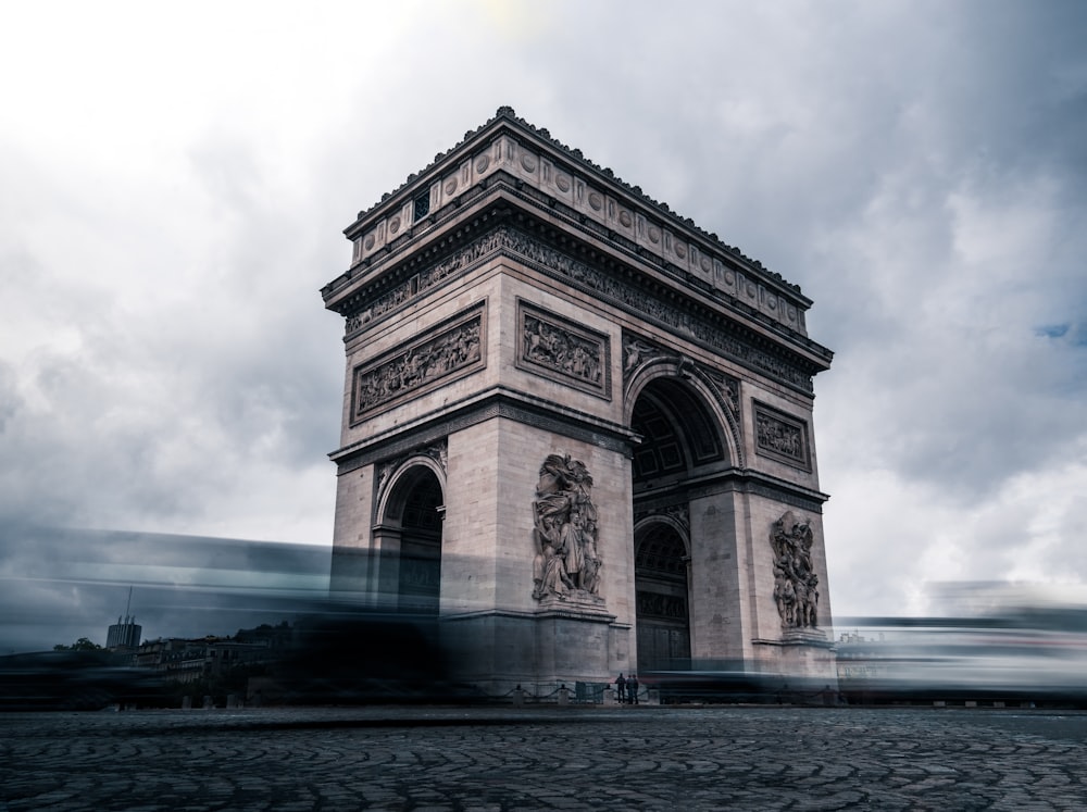 a very tall tower with a clock on it's side