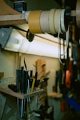 A close-up of tools neatly arranged on a workbench.