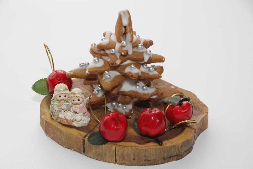 a small christmas tree made of cookies and cherries