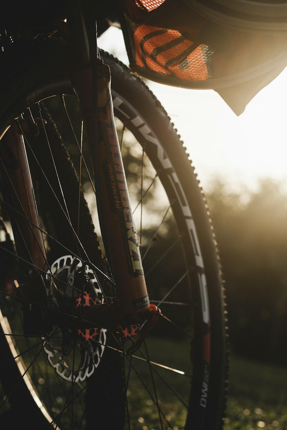 a close up of the spokes of a bicycle