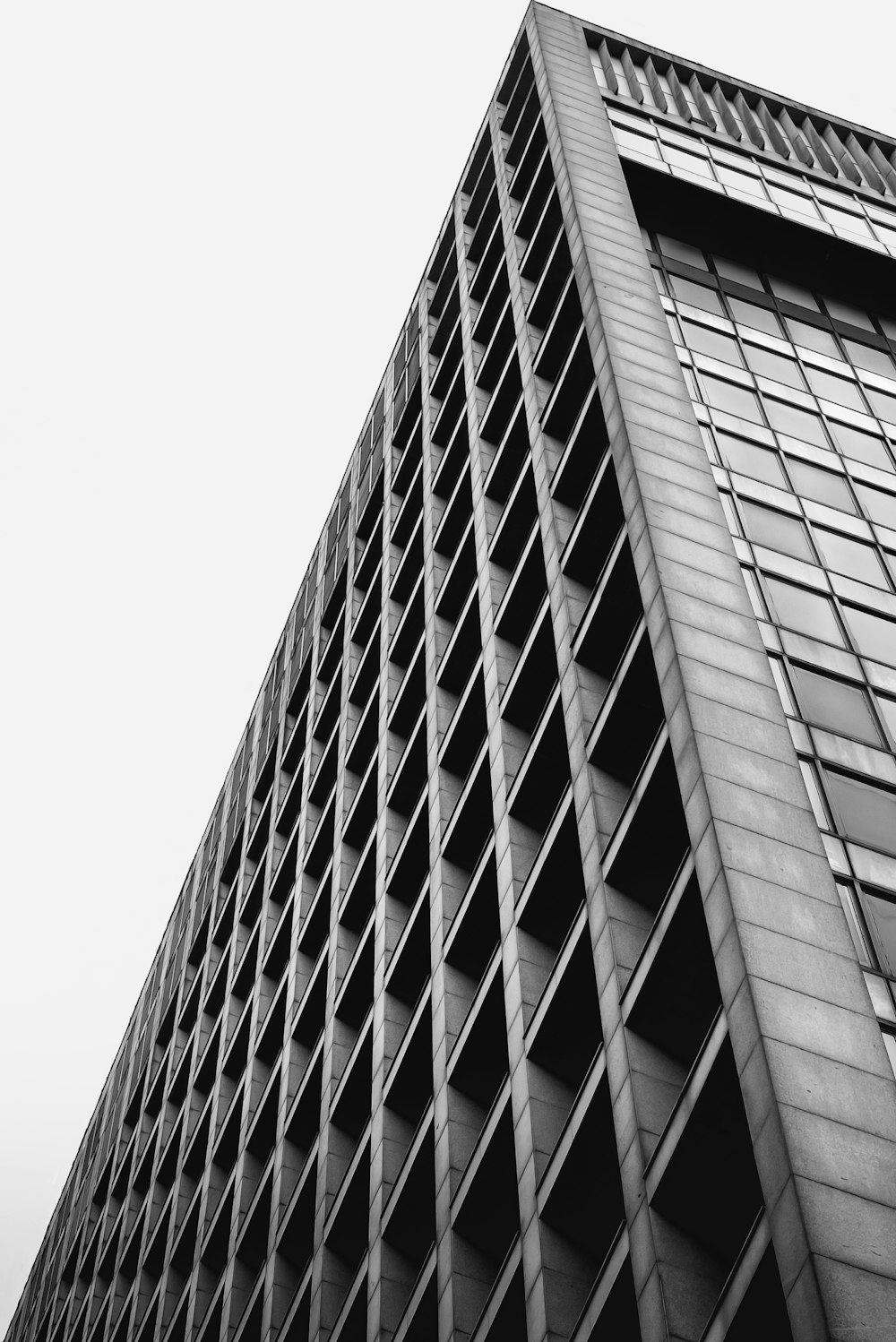 a black and white photo of a tall building