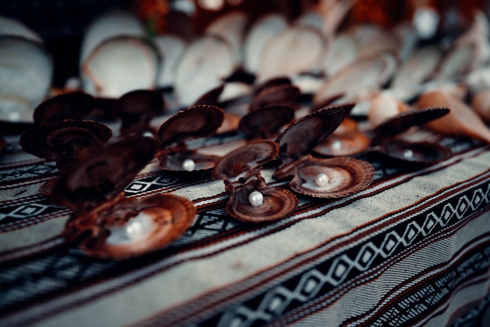 a table topped with lots of different types of buttons