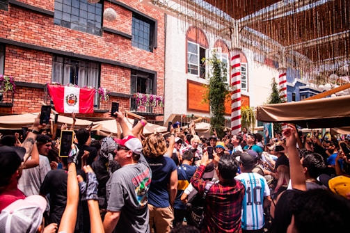 Community event with club members and supporters celebrating outdoors.