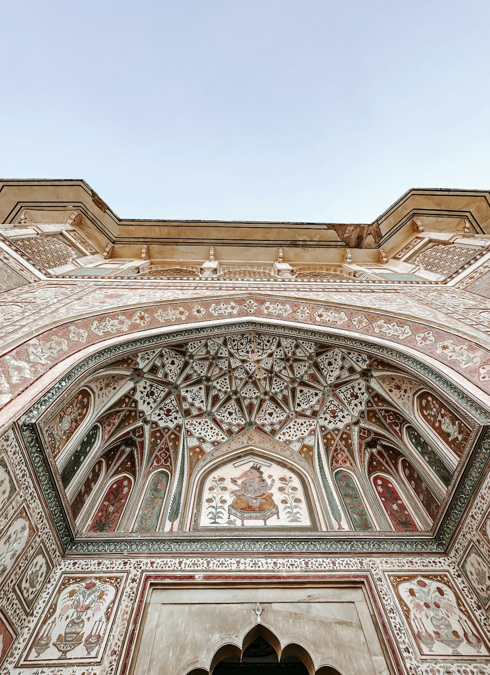 a large building with a very ornate design on it's side