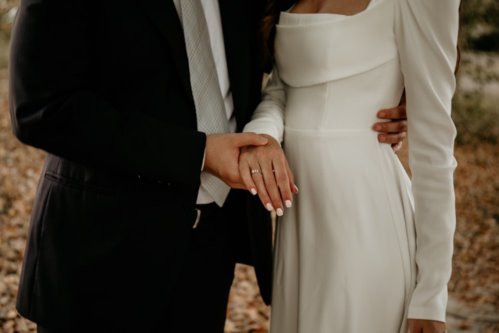 a man and a woman standing next to each other