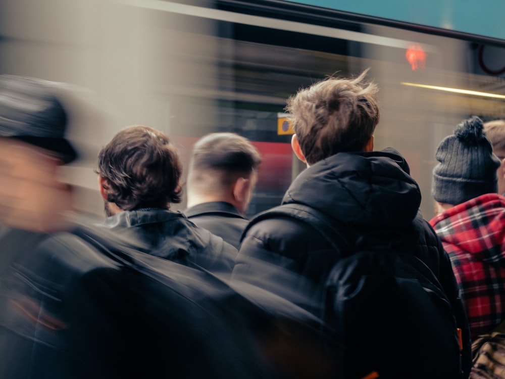 a group of people standing next to each other