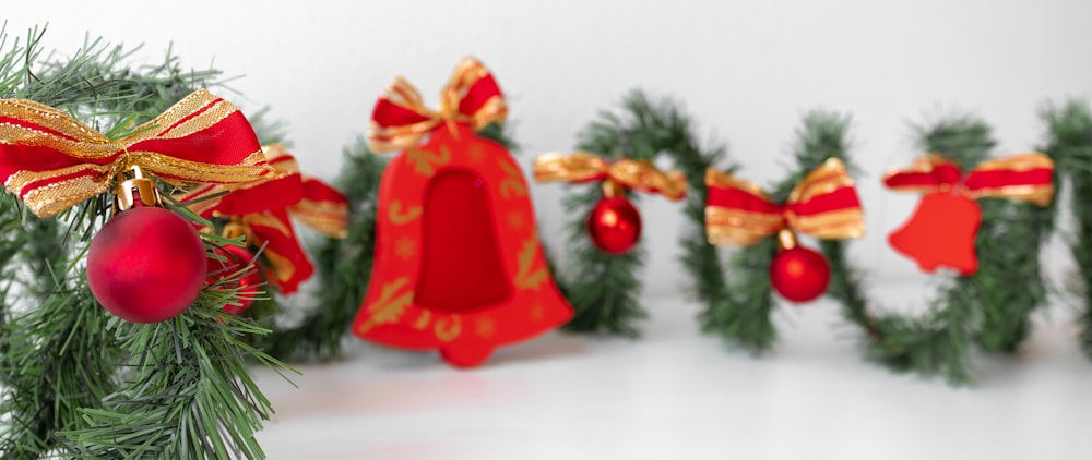 a group of christmas decorations hanging from a christmas tree