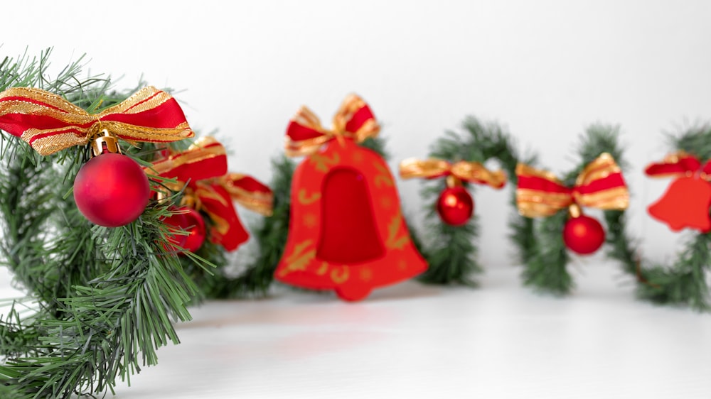 a group of bells hanging from a christmas tree