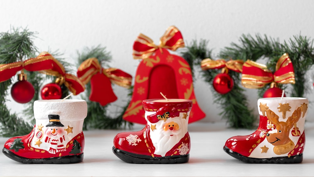 a group of christmas boots sitting on top of a table