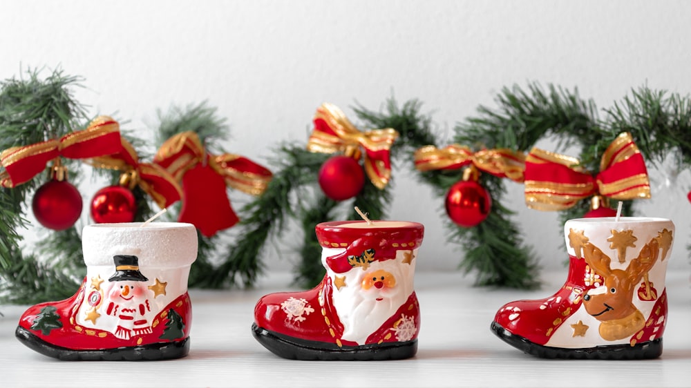 a group of christmas boots sitting on top of a table