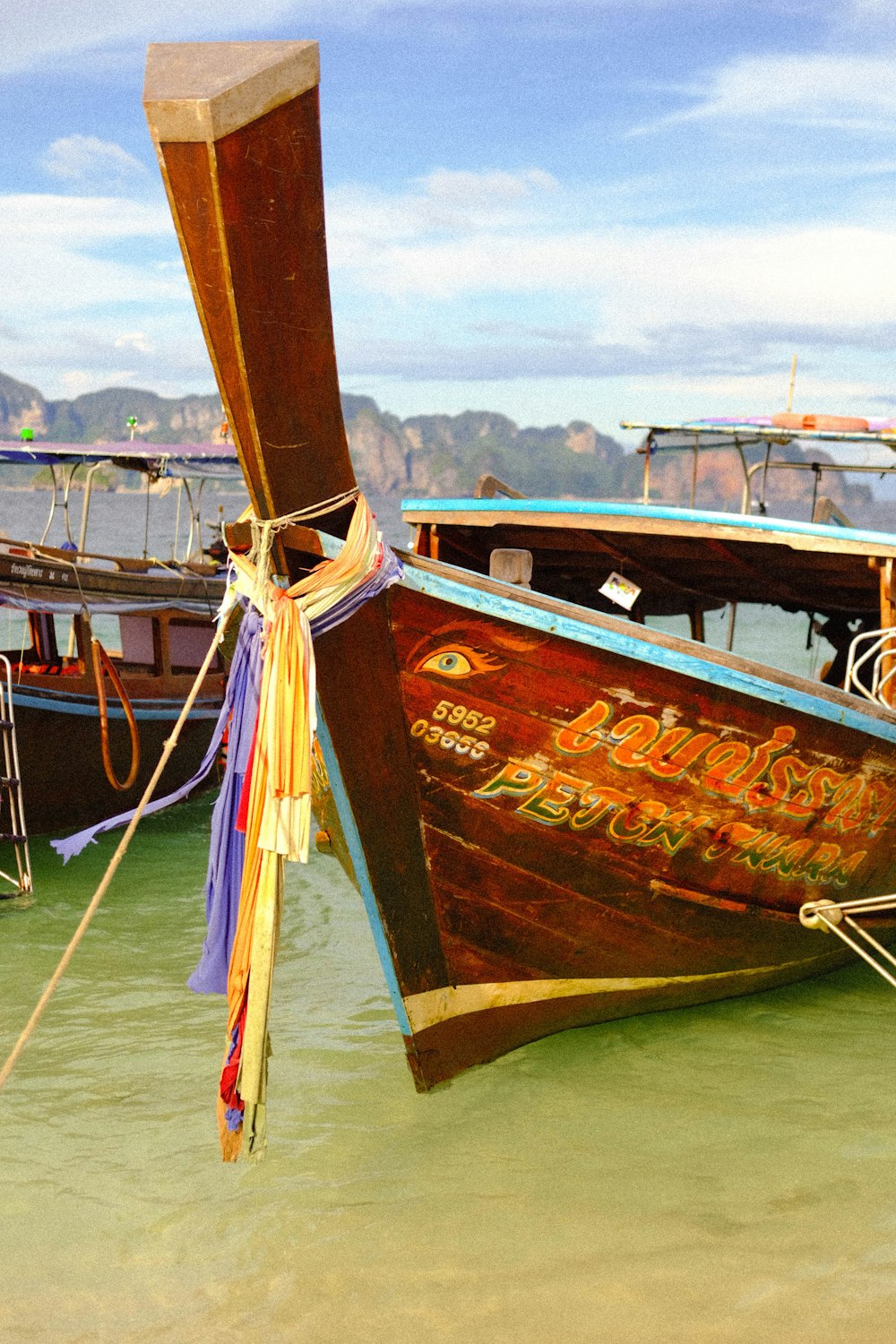 a couple of boats that are sitting in the water