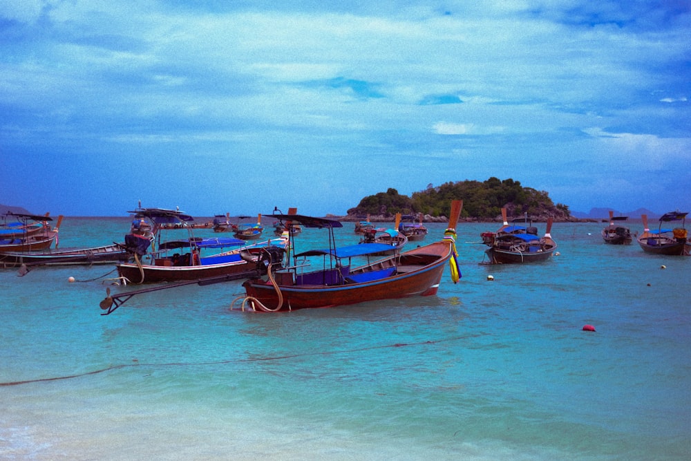 a bunch of boats that are in the water