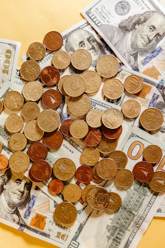 a pile of money sitting on top of a table