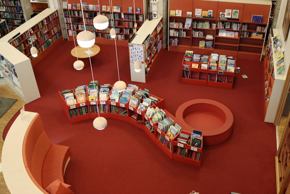 a library filled with lots of red books