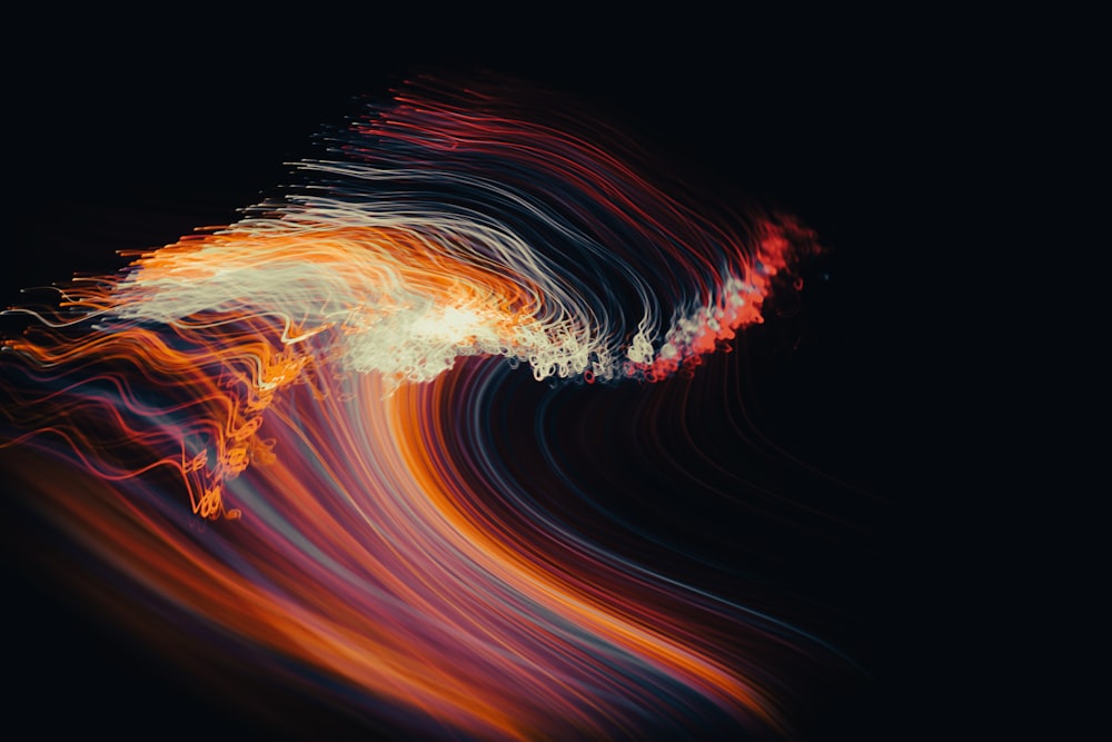 an abstract image of a wave in the dark