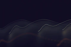 a black and white photo of a wave