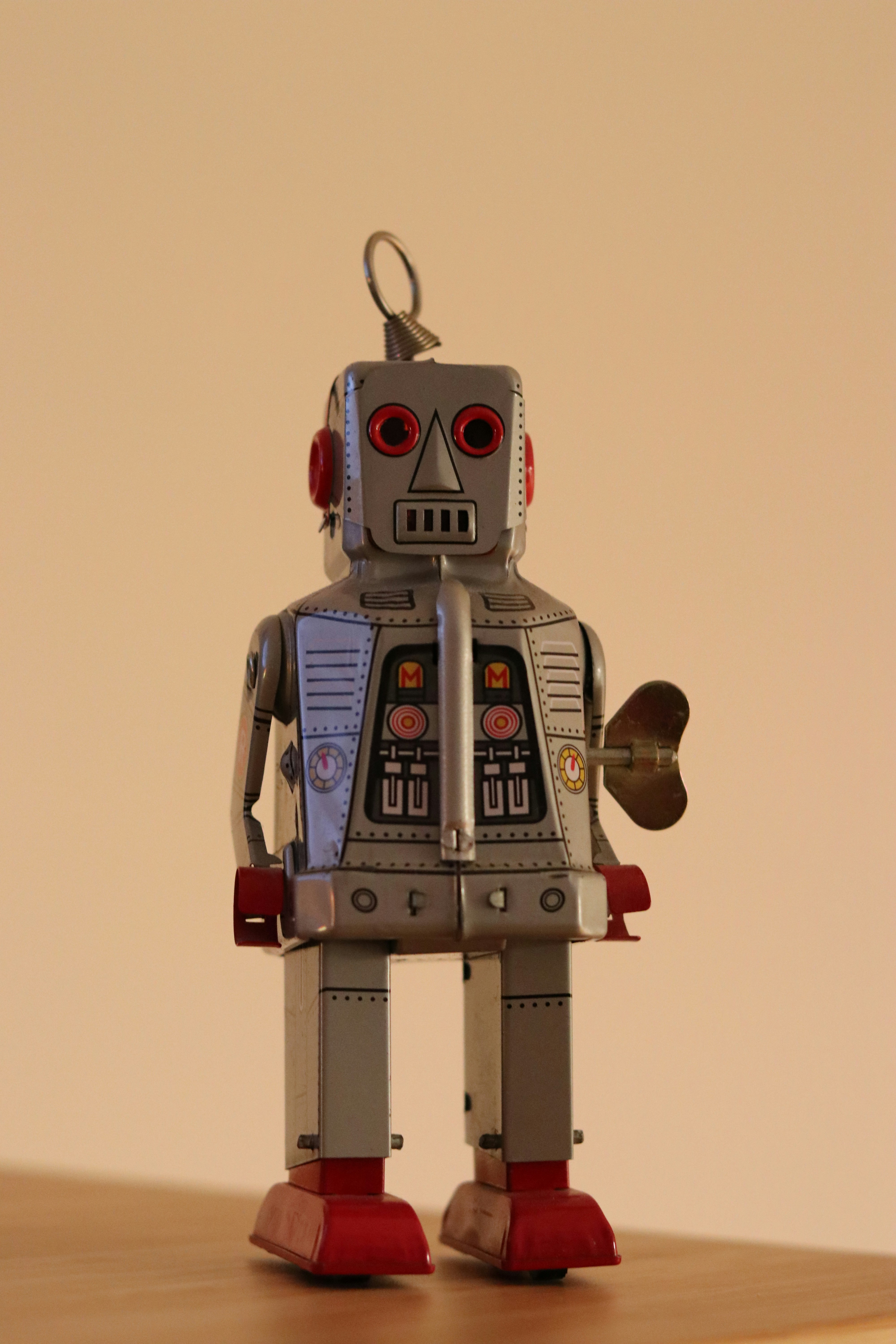 Alt text: Branimo toy robot sitting on a table