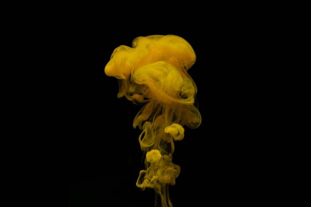 a yellow substance floating in the air