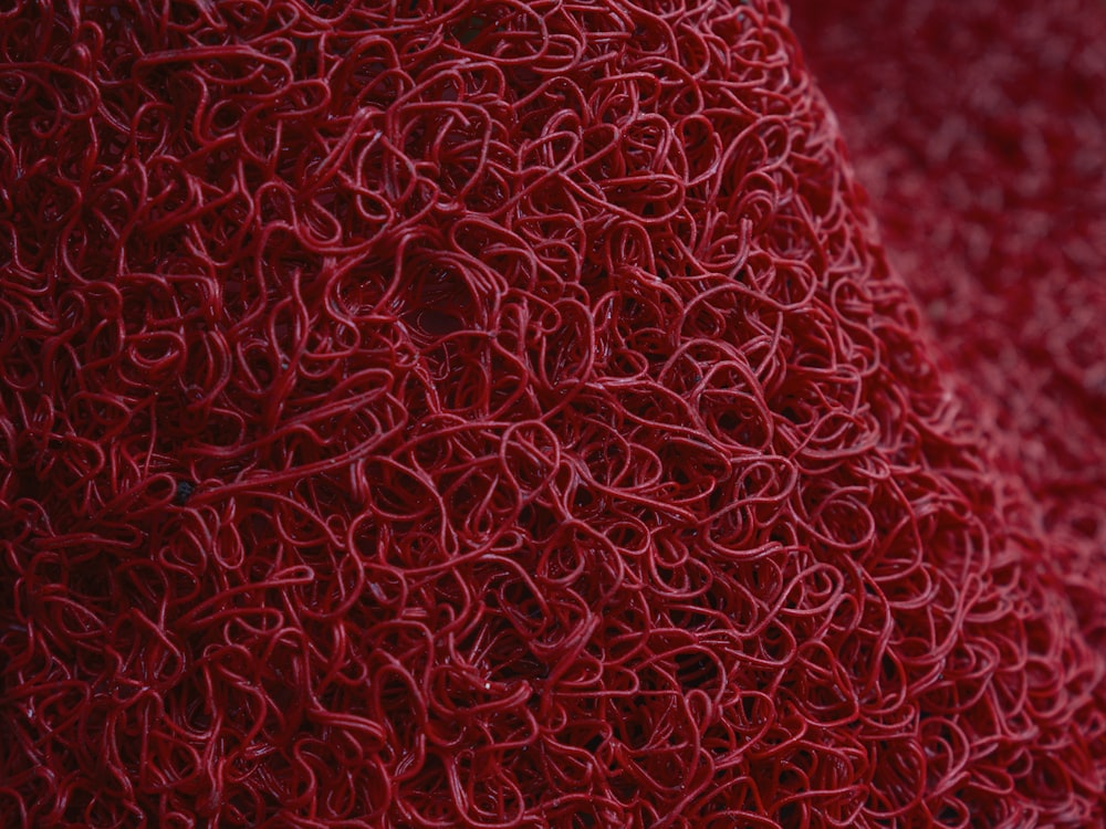 a close up of a red fabric texture