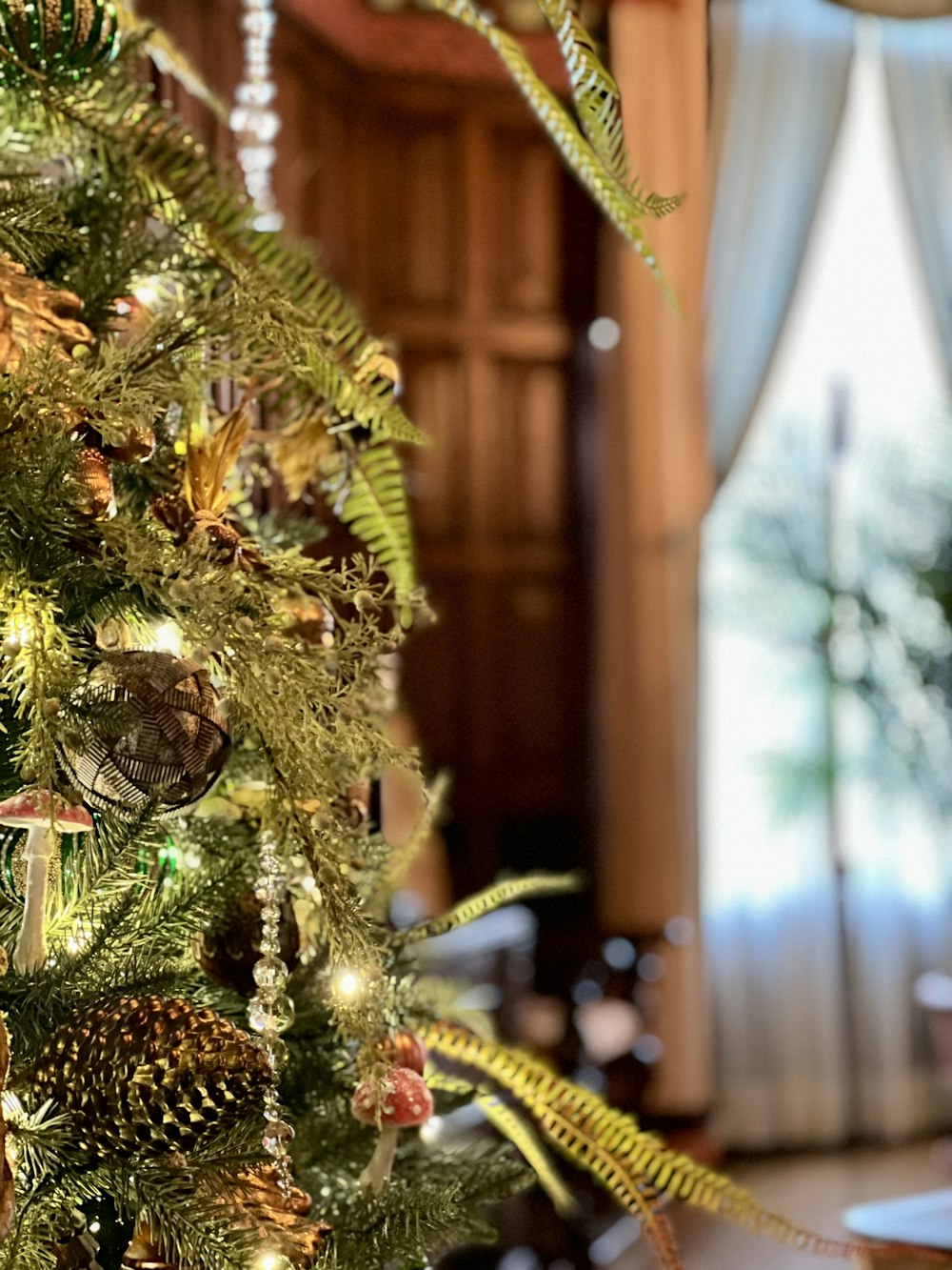 a decorated christmas tree in a living room