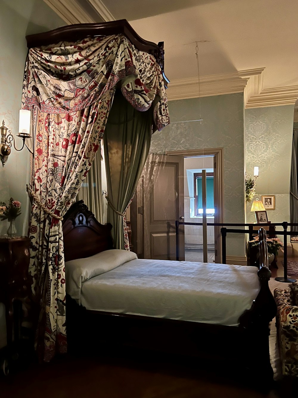 a bed with a canopy in a bedroom