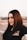 a woman with long hair and a black shirt