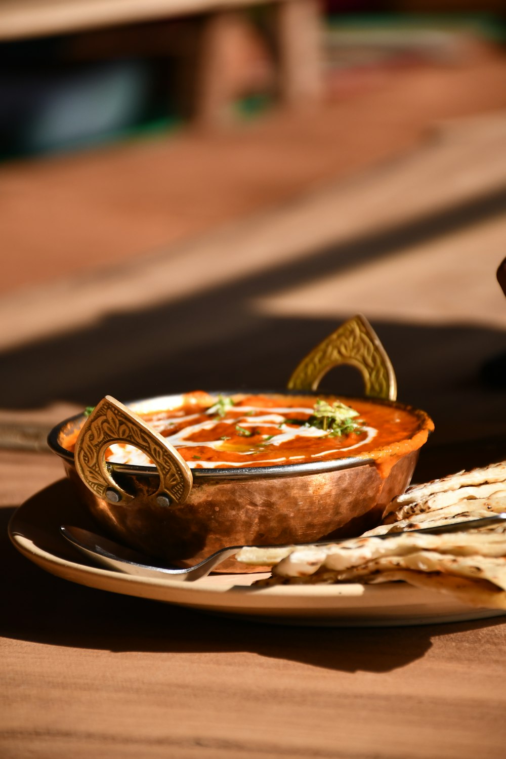 a plate of food on a wooden table