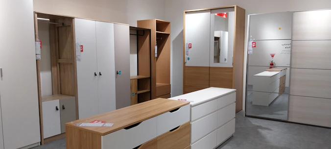 Modern modular wardrobe design with sleek finishes and smart storage solutions in a stylish bedroom.