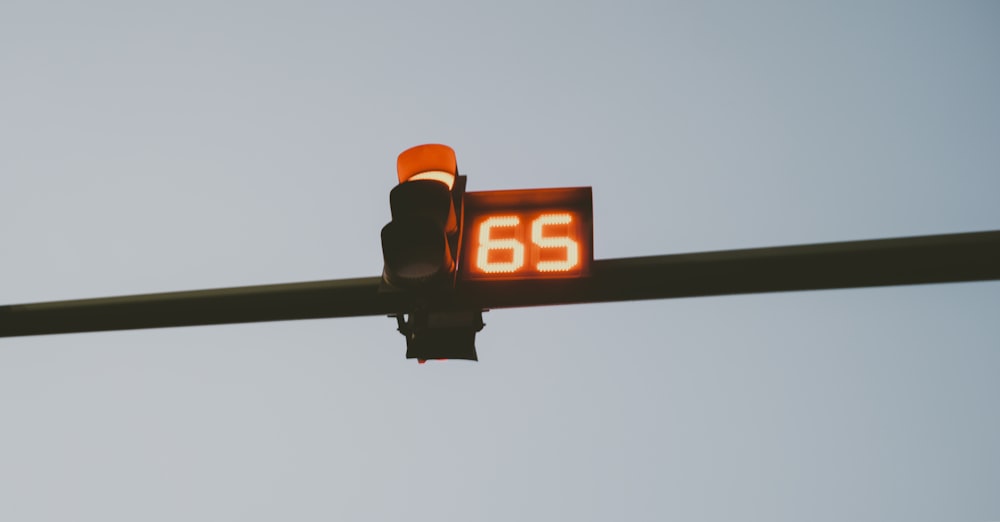 a traffic light with the number 55 on it