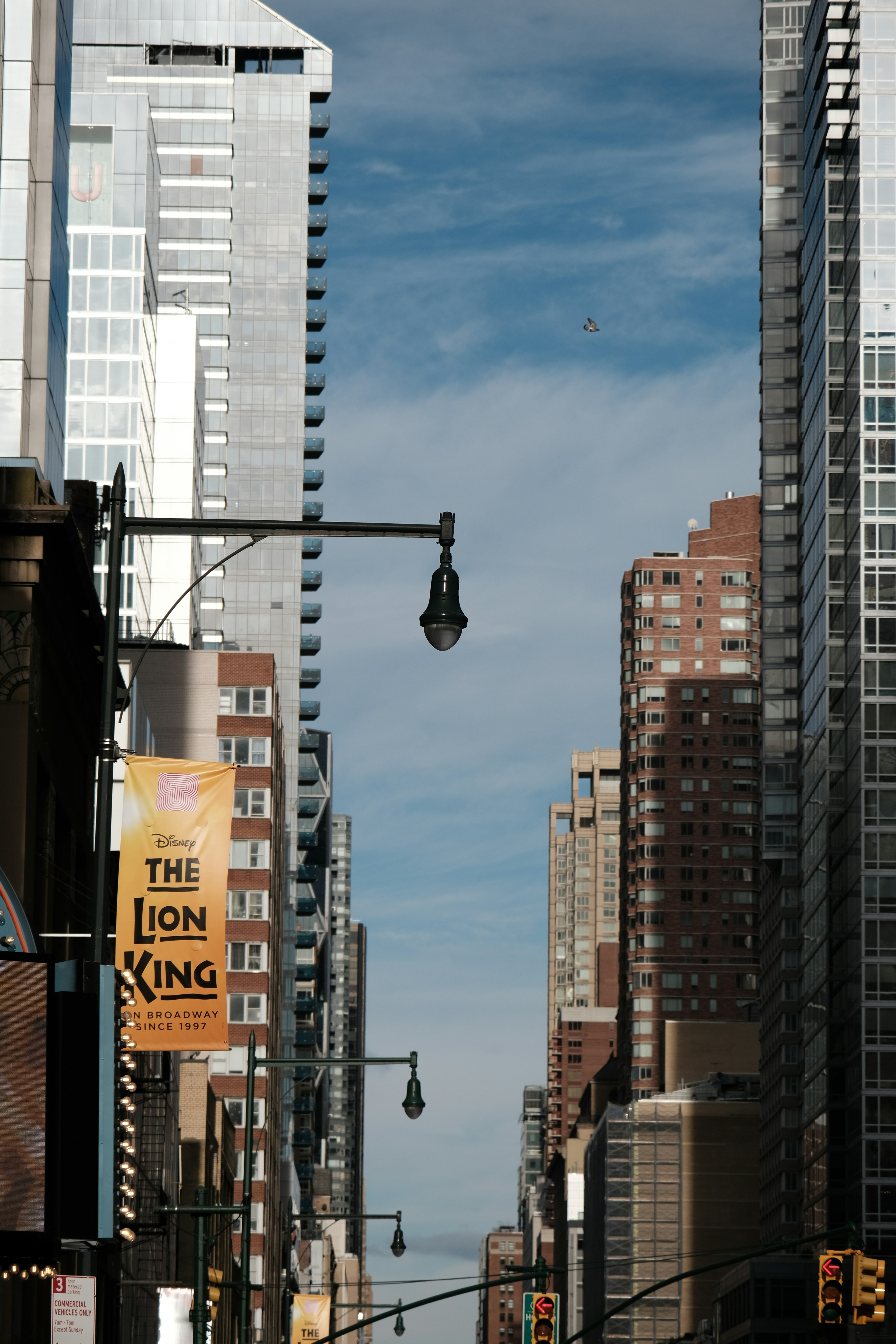 A city street filled with traffic and tall buildings photo – Free City ...