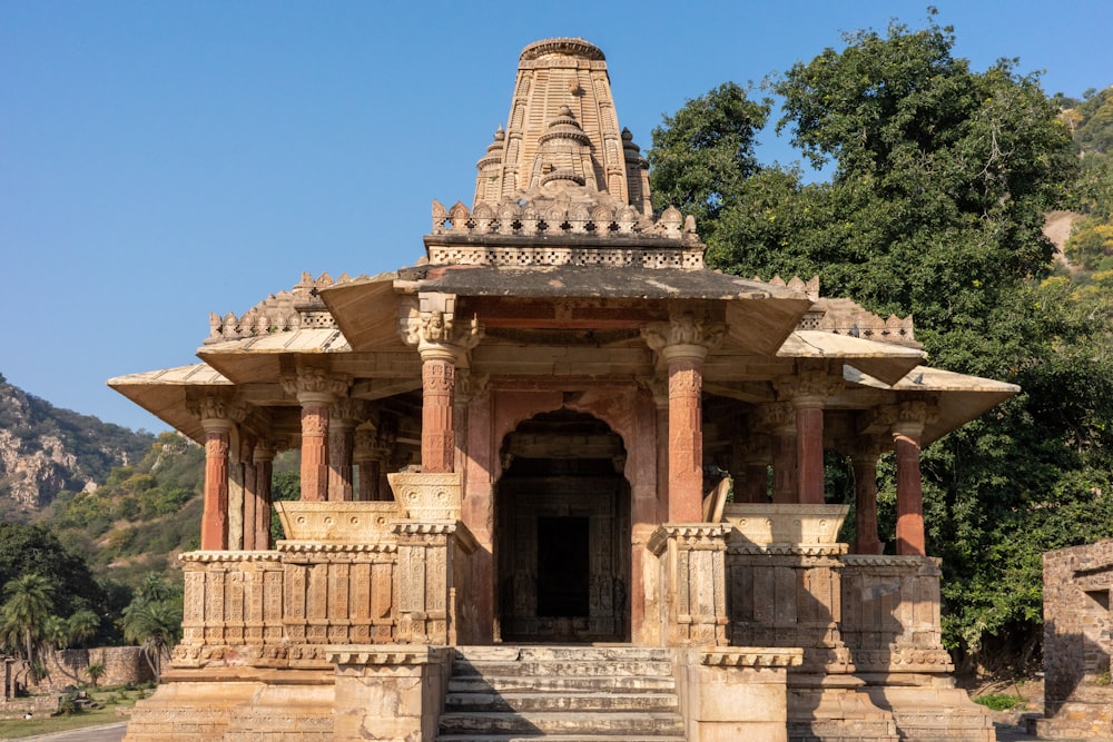 a large stone structure with steps leading up to it