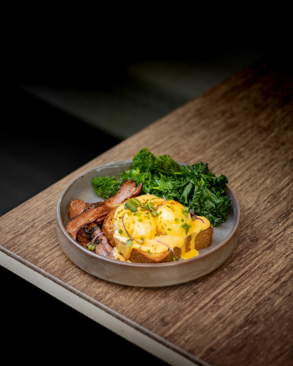 a plate of food on a wooden table