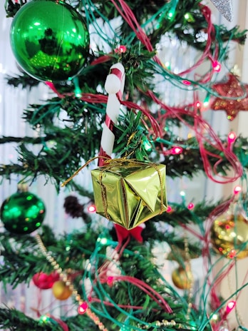 A beautifully decorated Christmas tree with surprise boxes underneath.