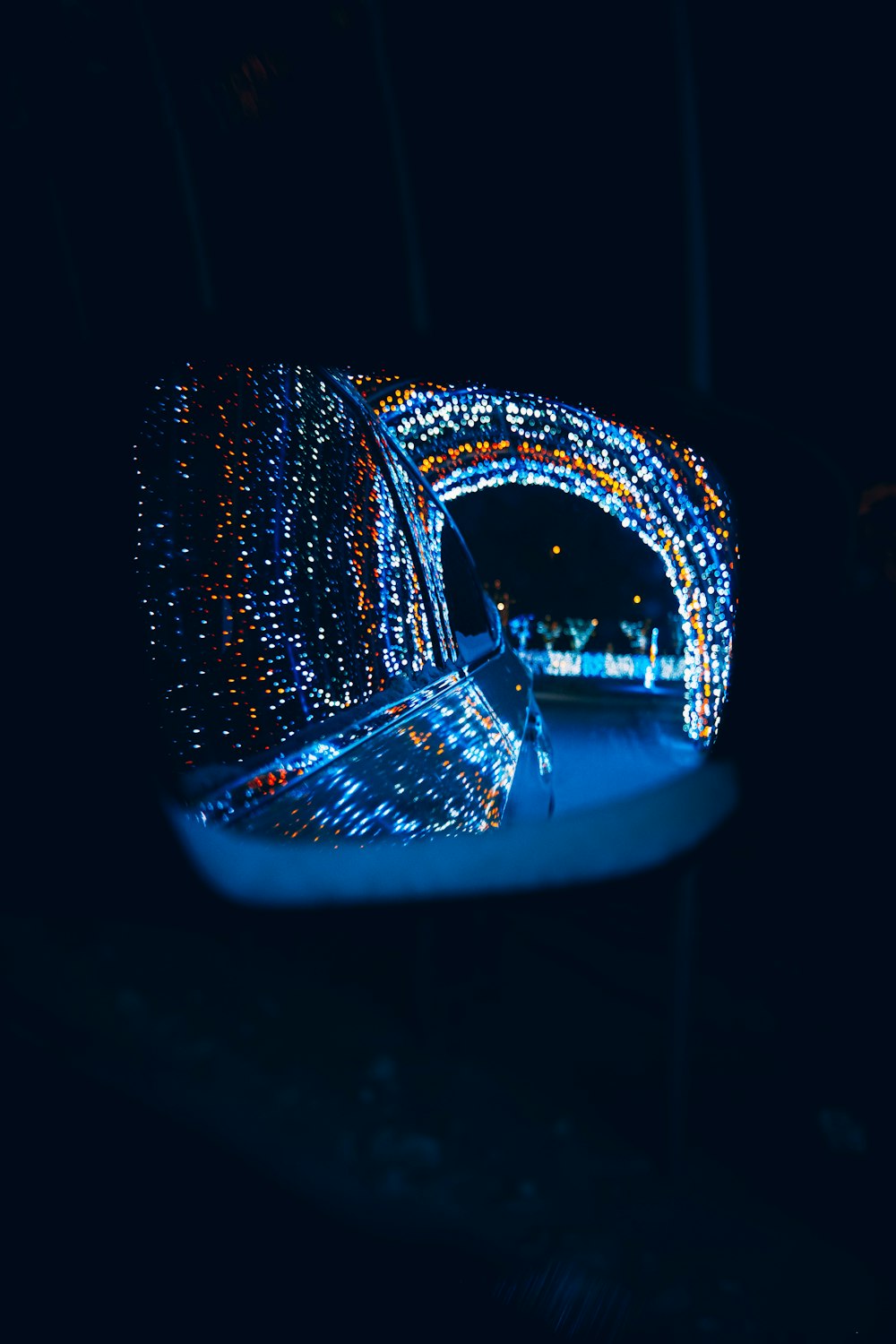 a bench covered in lights in the dark