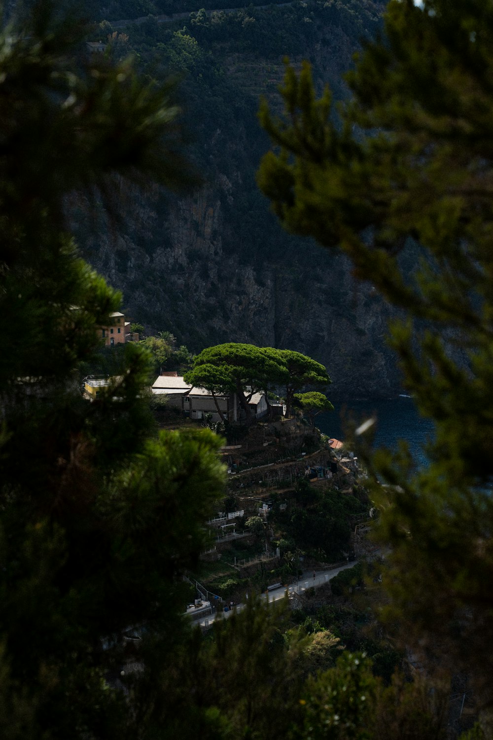 a view of a mountain with a house on top of it