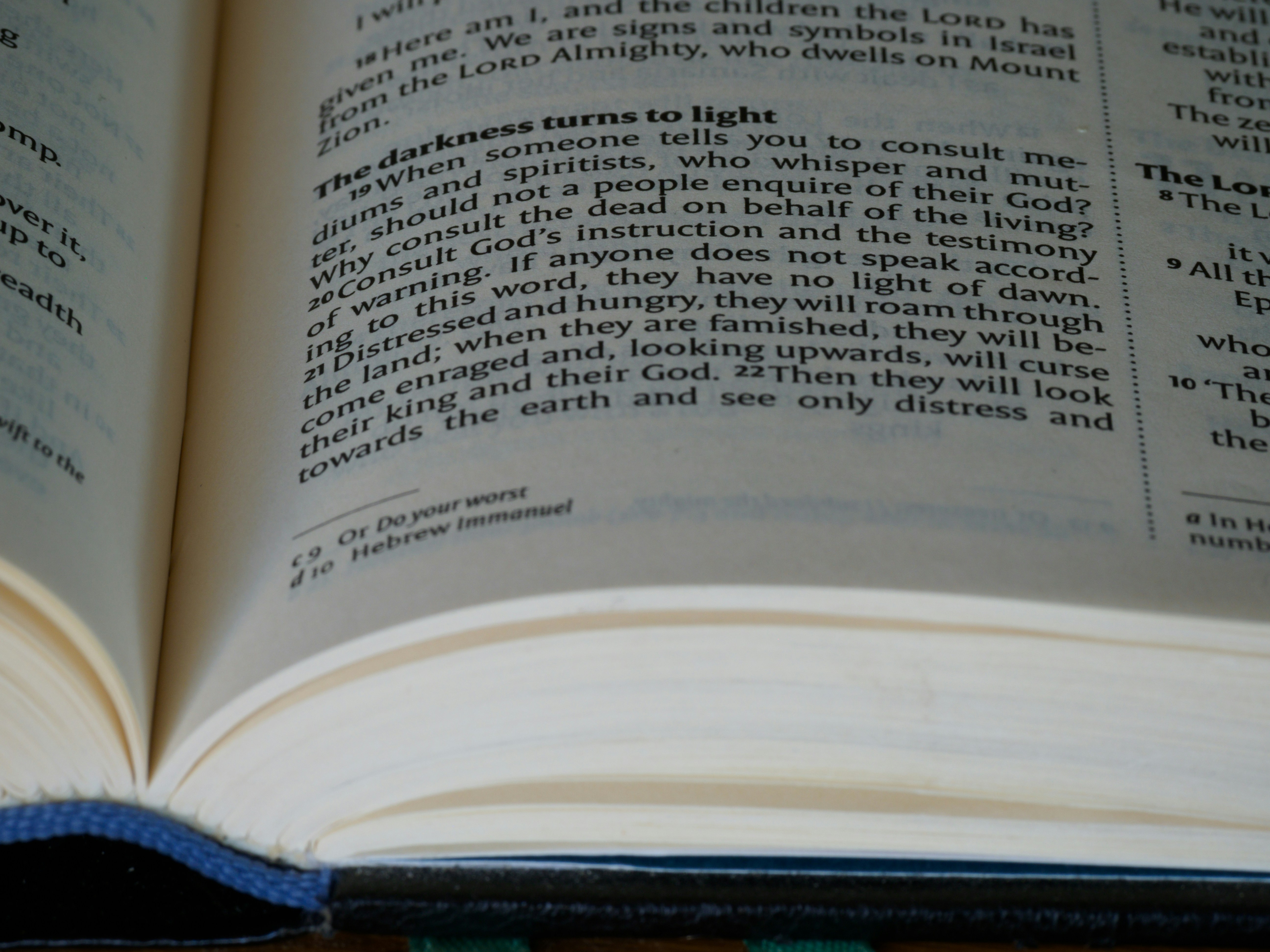 a close up of an open book on a table