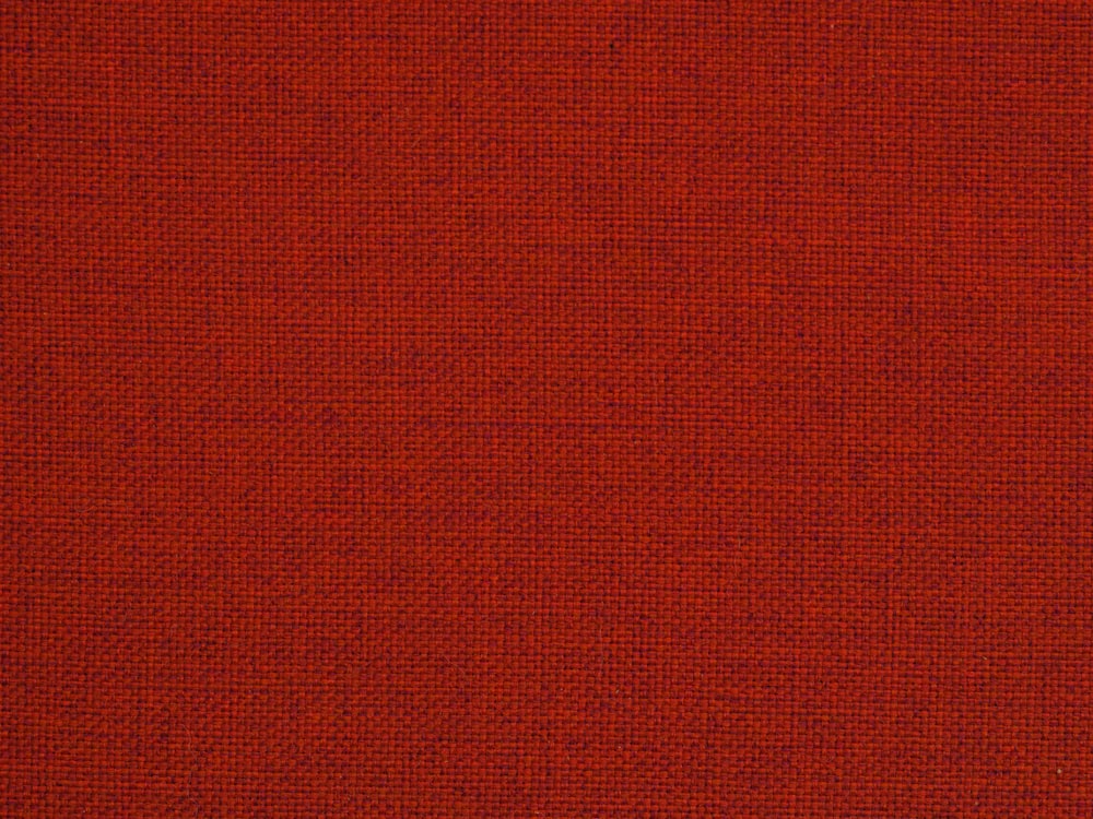 a close up of a red fabric texture