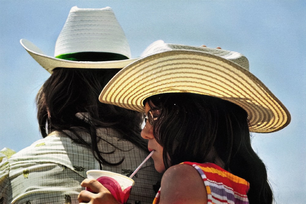 a couple of women sitting next to each other