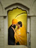 a man and a woman in a yellow turban