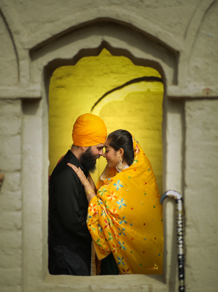 Couple in yellow and gold traditional attire