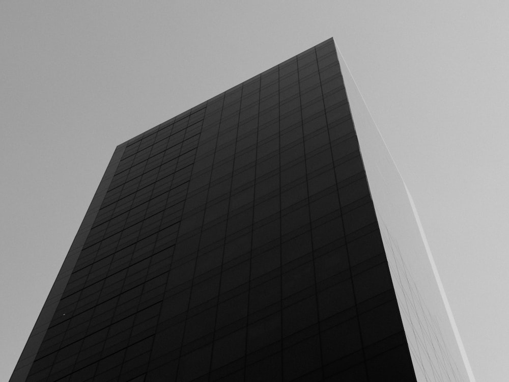 a black and white photo of a tall building