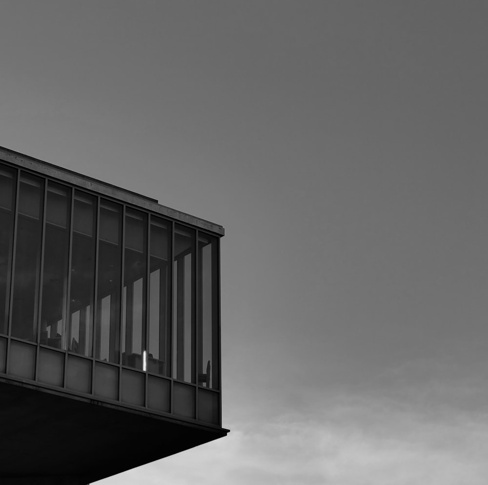 a black and white photo of a balcony
