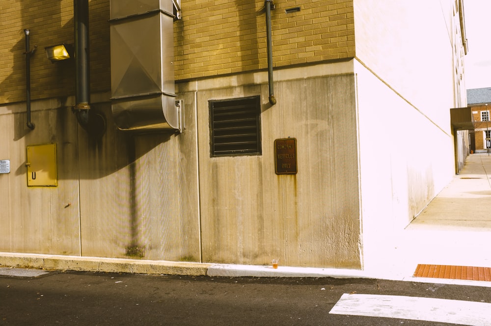 a building with a door and a window on the side of it