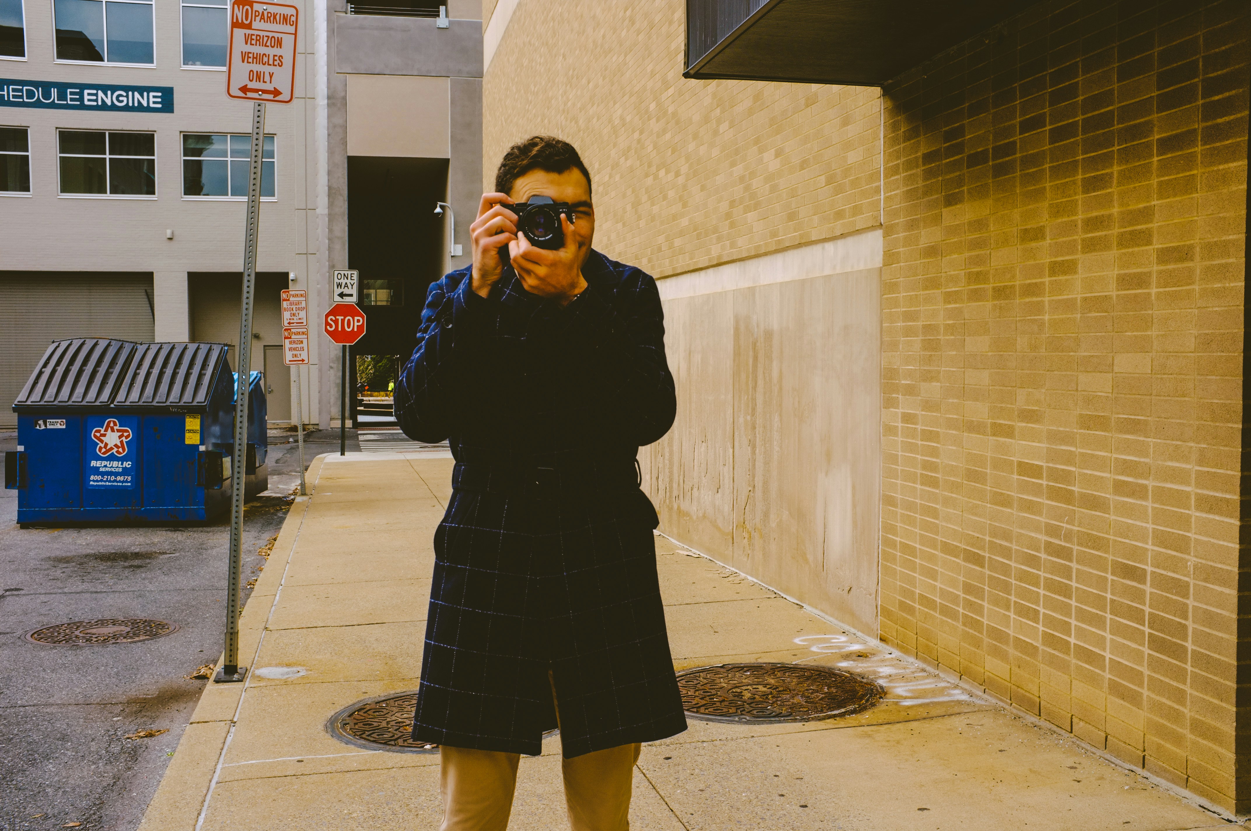 a man taking a picture of himself with a camera