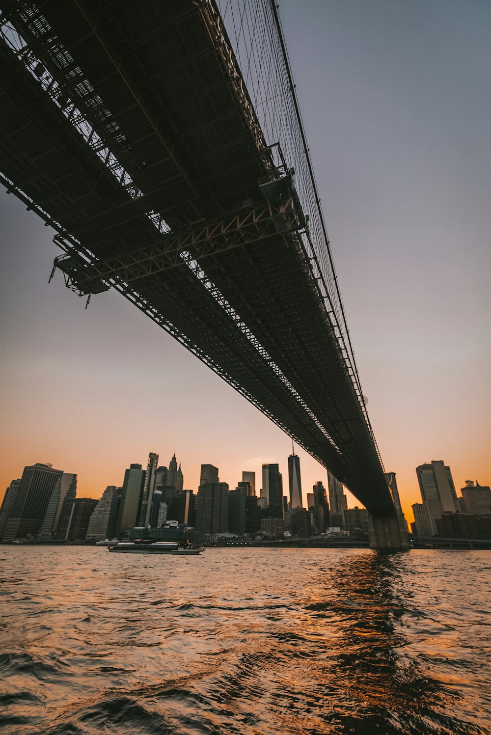 a view of a bridge over a body of water