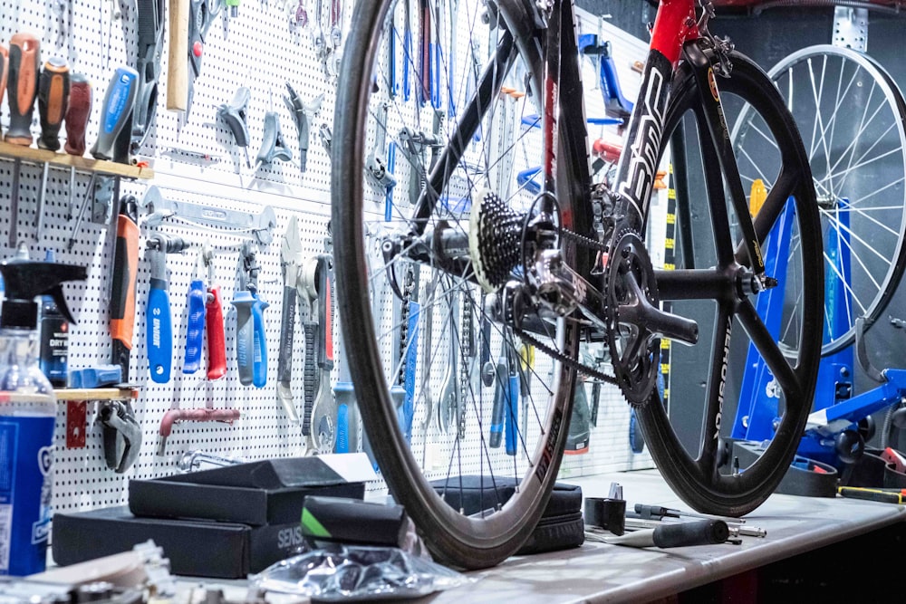 a bicycle on a table in a bike shop